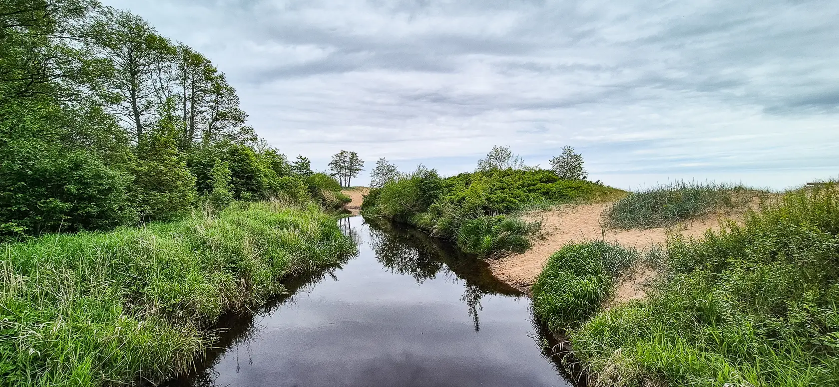 Latvia’s Wild Seaside Escape–Walk, Swim & Cross into Estonia